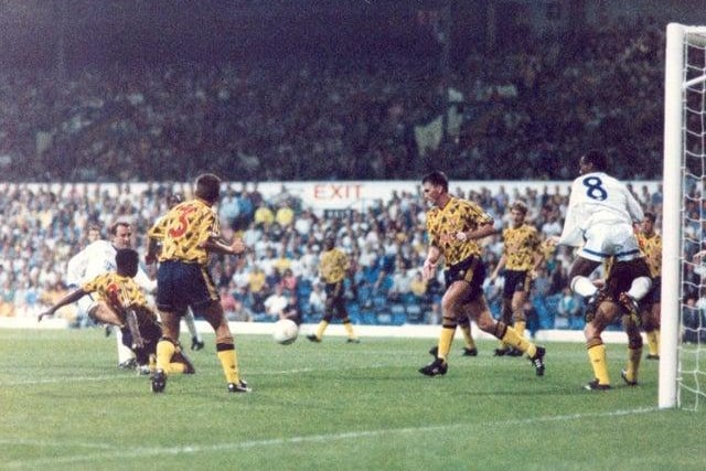 Rod Wallace takes evasive action as Gary McAllister fires for goal. The Whites came back from 2-0 to take a point.