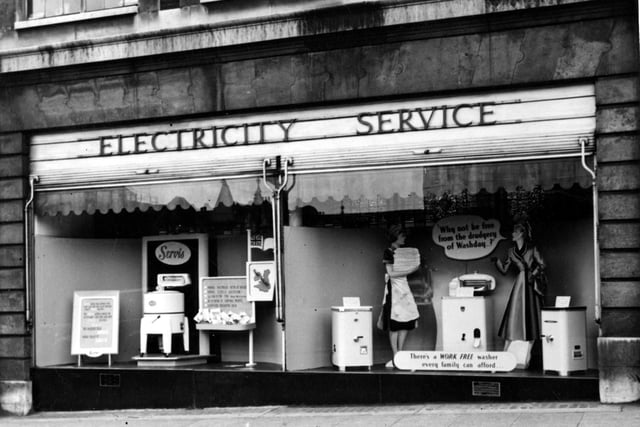 Electricity Showrooms on The Headrow which has two large window displaying the latest models of washing machines manufactured by Servis. This building now forms part of The Light complex.