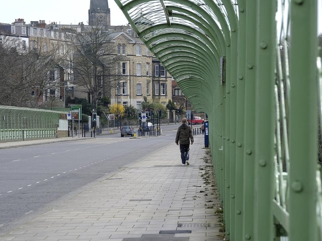 A solo walker on Valley Bridge.