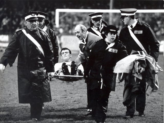 Mike Whitlow was stretchered off at the County Ground as the Whites were edged out in a five goal thriller.
