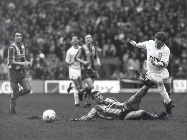 Gordon Strachan skips past a challenge.