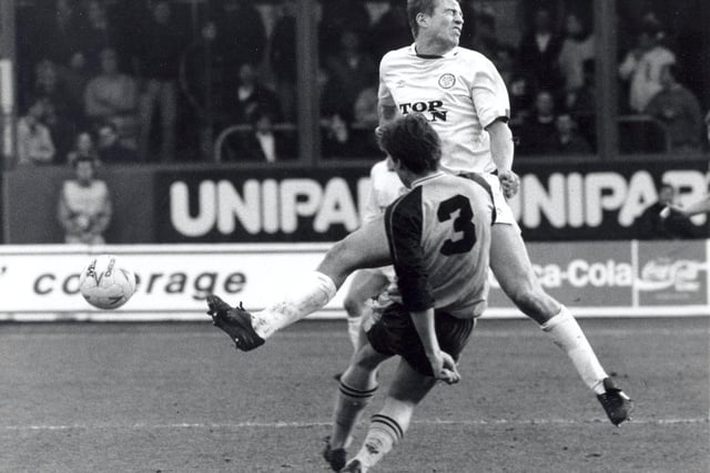 Lee Chapman takes one for the team at the Manor Ground. Remember the flying Leeds United fan?