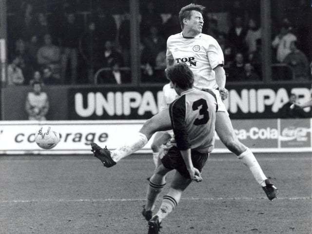 Lee Chapman takes one for the team at the Manor Ground. Remember the flying Leeds United fan?
