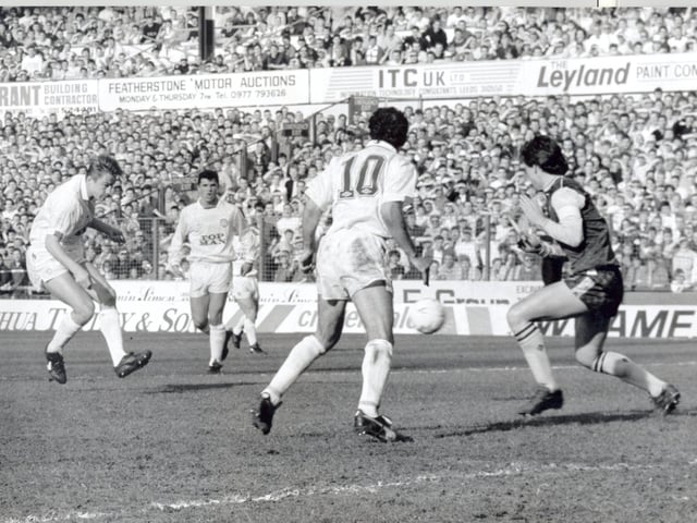 Lee Chapman shoots through a crowded penalty area to give the Whites the lead.