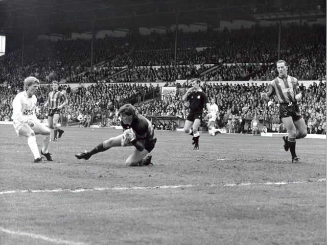 Gordon Strachan goes close. Do you remember when he took off his top in anger?