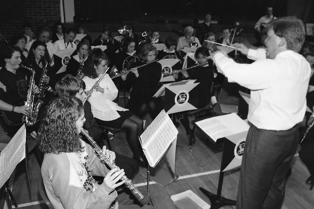 Music lovers at a Preston school sang their way to success as part of a 12-hour fund-raiser. The music marathon at Ashton High School, Preston, was held for the seventh time this year to help raise cash to buy a minibus for physically handicapped people in the area. Pictured above is the school band in action who took part