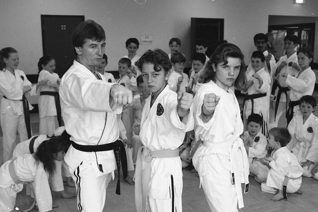 Karate kids kicked into action at a regular session for martial arts fanatics in Chorley. The sessions at Eaves Green Community Centre in Chorley are proving a big hit with growing numbers attracted to the sport. Instructor Terry Pemberton with James Pover and Jennifer Dearden are pictured at the karate class