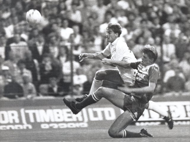 Gary Pallister halts an attack by John Hendrie at Elland Road.