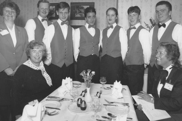 Yorkshire Coast College catering students prepared to be judged for the prestigious bi-annual Restaurant Skills competition run by the Cookery and Food Association in May 1995. From left, standing, Mary Oldfield (Fledglings restaurant manager), students, Leo Morris, Adrian Rummel, Nicola Newlove, Kerry McLaren, Nigel Pearson and Nick Carnes, with judges, seated, Hilary Glumark and Sue Brookes.
