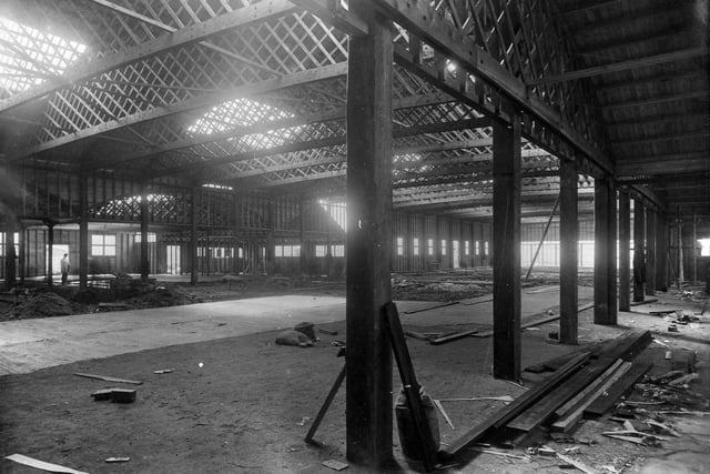 Interior view of the Box Factory building at the Barnbow National Filling Factory during the First World War, taken during its construction which started in early March 1916 and was completed in early May.