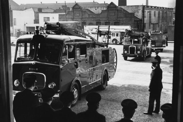 Leeds City Fire Brigade moved into its new headquarters at the city end of Kirkstall Road. Appliances are seen arriving there in convoy from the old Central Fire Station in Park Street.