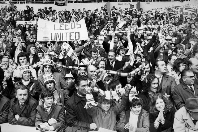 Leeds United supporters celebrate victory against Arsenal in the FA Cup final at Wembley.