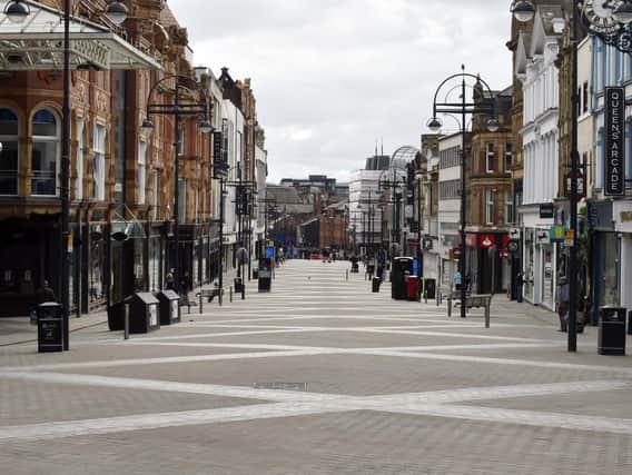 The normally bustling Briggate has fallen silent.