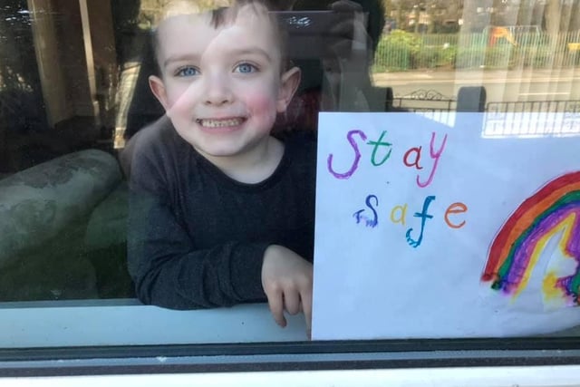 Families are painting rainbows in their windows to spread message of hope during coronavirus pandemic