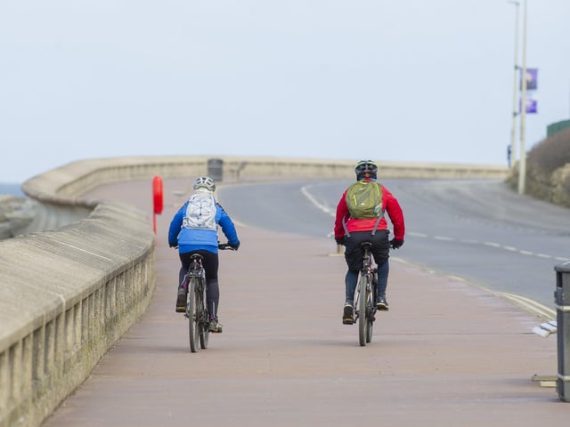 Getting daily exercise on a quiet Marine Drive.