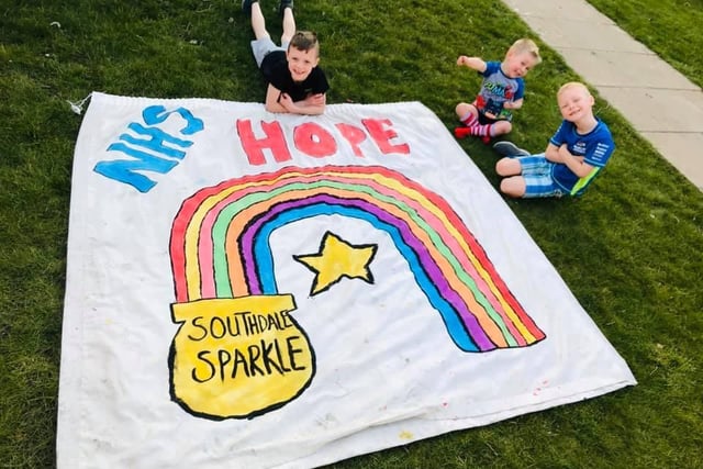 Joe, 9, Ollie, 6, and Tom, 3, all joined forces to make this giant rainbow.