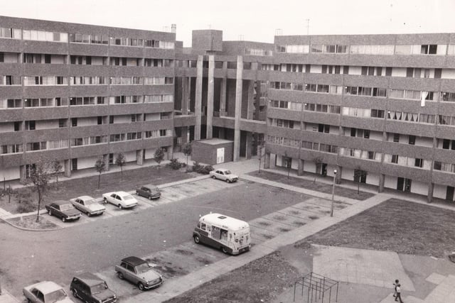 The exteriors of the 2,500 flats were covered in pale grey pebbledashed concrete. Have you spotted the ice cream van in this photo from July 1976?