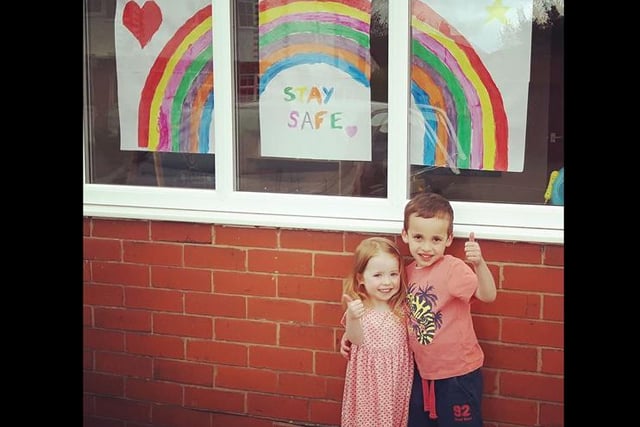 Manny (5) & Nene (3) in Penwortham with their painted window rainbow, sent by Nazma Ahmed