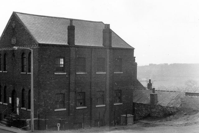 The semi-derelict Methodist Chapel from Leeds Road (B6137) on the corner of Well Lane and Leeds Road. The final service was held here in June 1961 before the building was sold off to the council. Demolished in 1969.