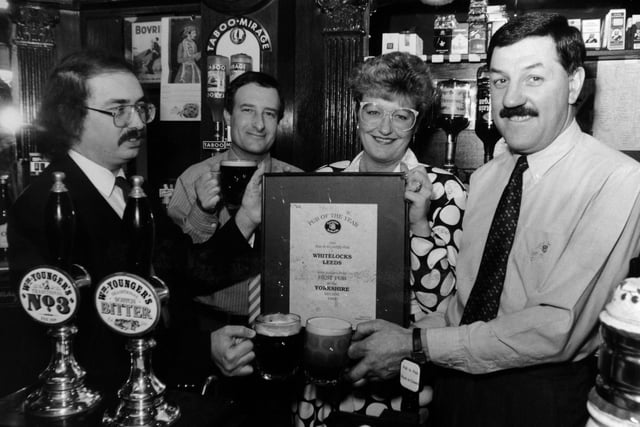 The landlord of Whitelocks, Fred Cliffe (right) and his wife Julia, receive the Campaign for Real Ale's regional best pub of the year award.