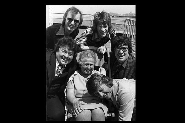 Holidaymaker Millie Helliwell with Eddie Large, Syd Little, Jim Davidson, Frank Carson and Norman Collier on North Pier in Blackpool