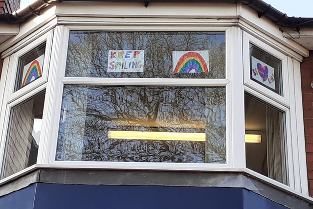 Images of rainbows and positive messages have appeared in windows to brighten up people's day.