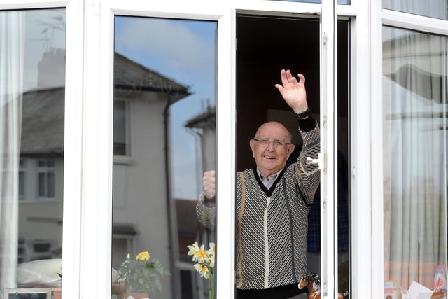 When John Stott turned 91 last week, his whole street came out to sing 'happy birthday' to him through the window.