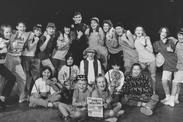 Musicians, dancers, actors and singers from the YMCA gather round for a photo to promote the Red Nose Variety Show back in March 1991. Do you feature in the picture?