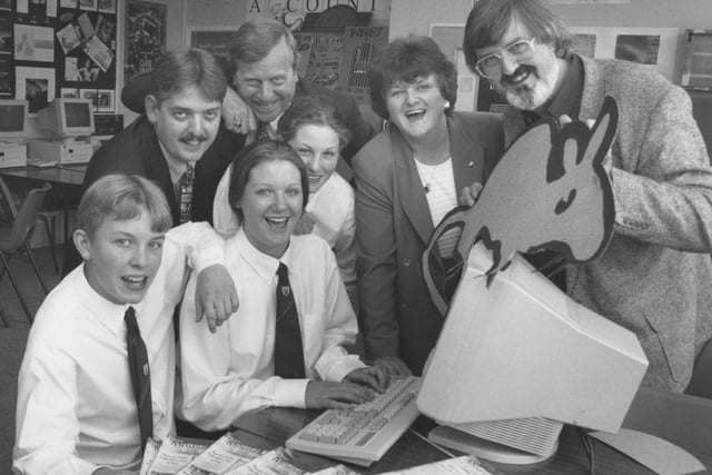 MousePower and IMRG had a sponsorship deal with Pindar School in 1997. Celebrating the deal are front, pupils, Michael Thompson, Kelly Dove and Jenna Holliday; back row, teacher Pete Lancaster, Peter Jones and Jo Tucker (of IMRG), and John Roland (of MousePower).
