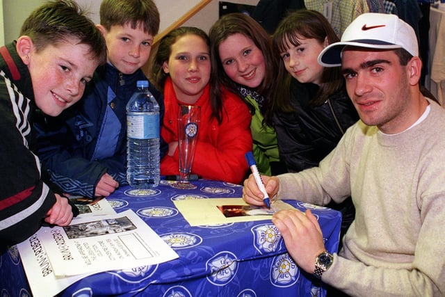 February 1998 and Bruno Ribeiro signs autographs in Leeds United's shop in the Burton Arcade. Pictured, left to right, are Richard Gordon, Andrew Gordon, Natalie Kamis, Toni Marsh, and Catherine Kamis.