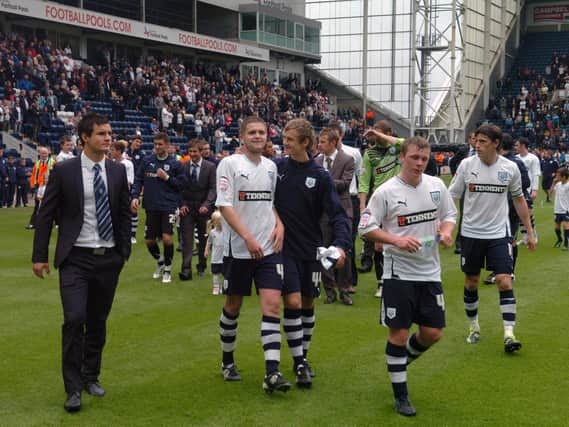 Preston's relegated squad walk around their lap of appreciation after their final league game against Watford.