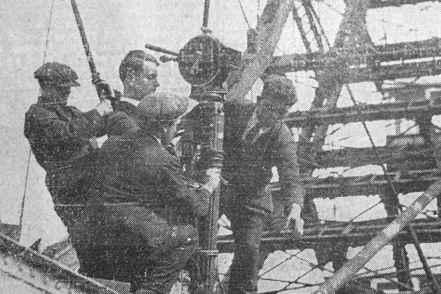 A cameraman from the Paramount Film Company is strapped to the Big Wheel in Coronation Street for his upside down ride