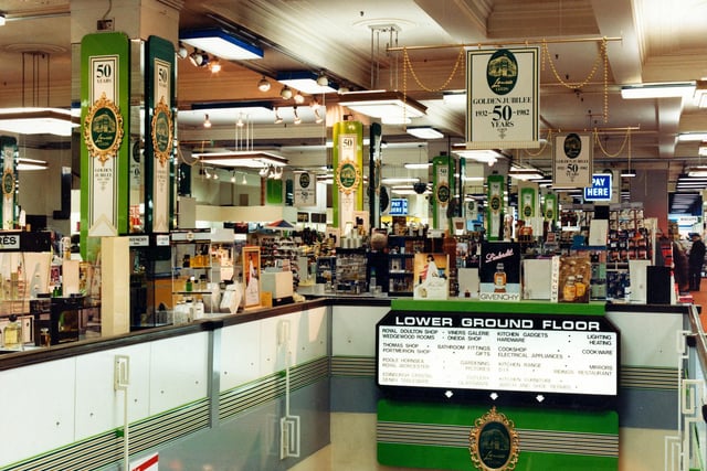 The ground floor at the time of the store's Golden Jubilee in September 1982 featuring the newly-modernised food hall where you could buy freshly cut cheeses and loose biscuits sold by weight.