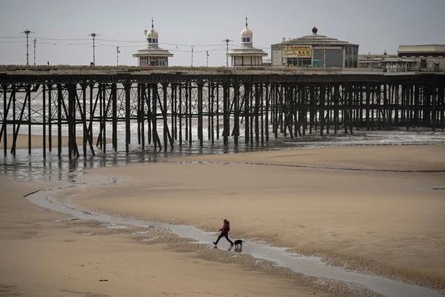 Blackpool's Golden Mile is near deserted of holiday makers and locals (Photo by Christopher Furlong/Getty Images)