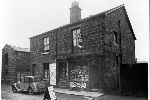An off licence on Green Road selling sweets, the premises of R. Joseph. Signs around the shop have been crossed through on the image by a council officer.