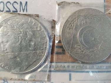 Coins seized by police during burglary investigation.