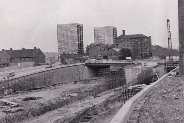 The newly built Lovell Park blocks of flats overlook older parts of Leeds in this picture showing the progress being made on the second stage of the Leeds Inner Ring Road.