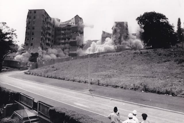 These tower blocks in Bramley began to tumble as explosives were detonated.