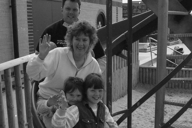 A family enjoy the funfair in St Annes