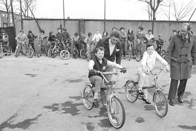 Students at Woodhouse First School, Normanton, receive cycle training in the school playground.