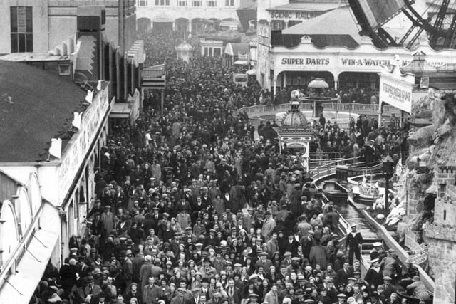 It was a good job they did because another photo taken just a few days later on Easter Monday 1934 shows a tide of people walking through the Pleasure Beach. You can hardly put a pin between them.