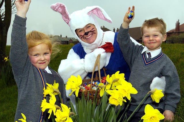 Easter Bunny  Egg hunt at King Edward VII and Queen Mary Infant School, Lytham Oscar O'Neil (4) and Alanis-Sky Parkinson (5) with the Easter Bunny-headmistress Meg Hargreaves.