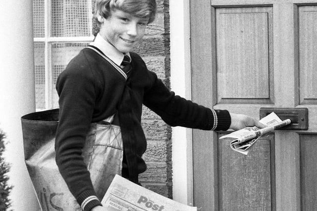 Newspaper boy Jason Williams, 13, with his pet duck, Frankie, which accompanied him on his paper round in Shevington in 1983.