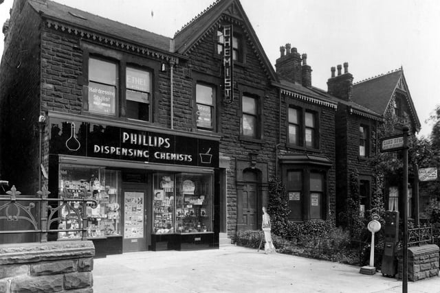 Photograph taken around 1940 of Phillips Dispensing Chemist which was at 168 Chapeltown Road. Ethel Lewis, hair stylist and beautician can be seen above.