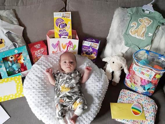 Henry, one-month-old, enjoys his first Easter.