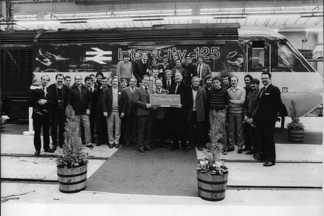 Staff at the Neville Hill Rail Depot in Leeds, in front of the high speed locomotive Neville Hill, named at an unveiling ceremony at the depot.