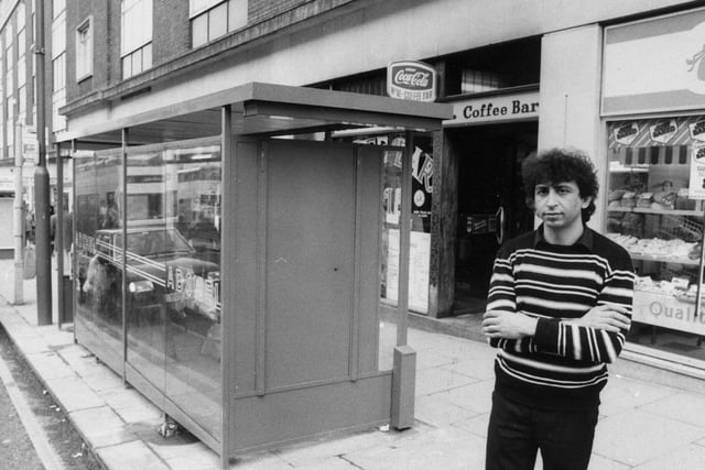 This is Louis Karim, pictured against a bus shelter, which he claimed was blocking his coffee bar on Eastgate in the city centre.