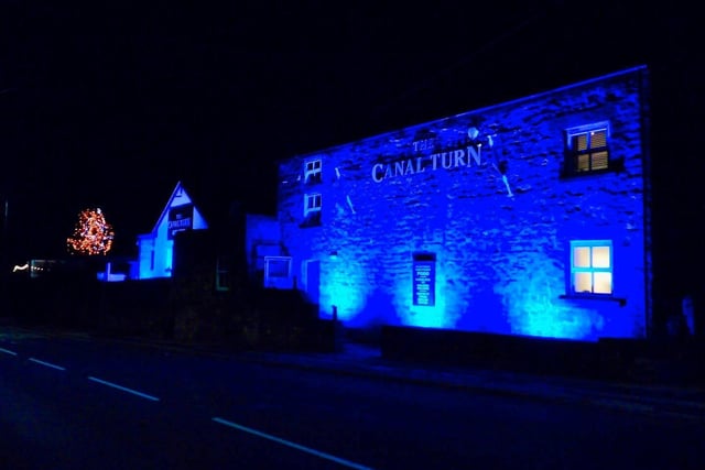 Bill Johnston has lit up the Canal Turn pub in Carnforth in blue in support of the NHS. It will remain lit up seven days a week from 8pm until 4am until the crisis is over.