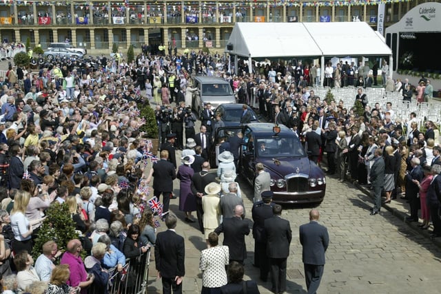 HRH the Queen and the Duke of Edinburgh prepare to leave the Piece Hall