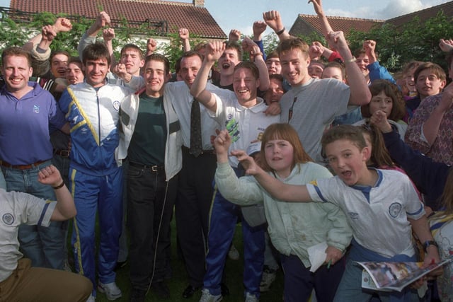 This photo was taken in Lee Chapman's garden after Leeds United were confirmed as champions. Lee Chapman, Eric Cantona, David Batty and Gary McAllister are pictured with fans.